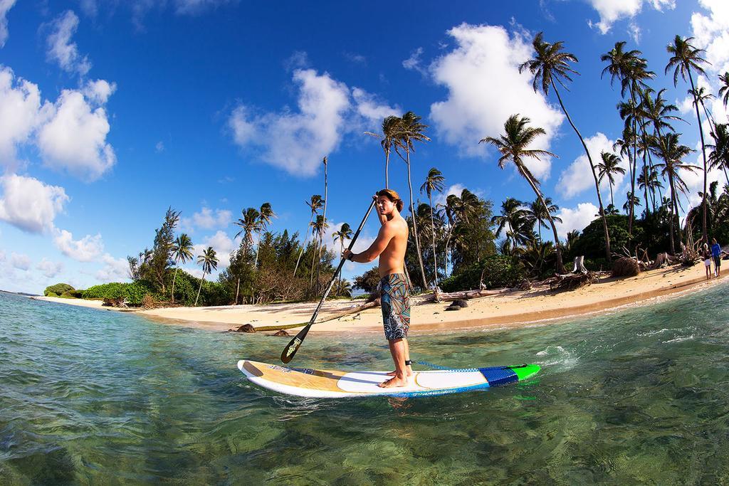 Prama Sanur Beach Bali Екстериор снимка Stand up paddle boarder on the beach